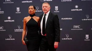 Manu Fernandez/AP : Boris Becker, right, and Lilian de Carvalho Monteiro arrive at the Laureus Sports Awards ceremony in Madrid, Spain on April 22, 2024.