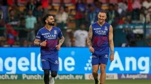 AP Photo : Royal Challengers Bengaluru's captain Faf du Plessis, right, and Virat Kohli warm up before the Indian Premier League cricket match between Royal Challengers Bengaluru and Gujarat Titans in Bengaluru.