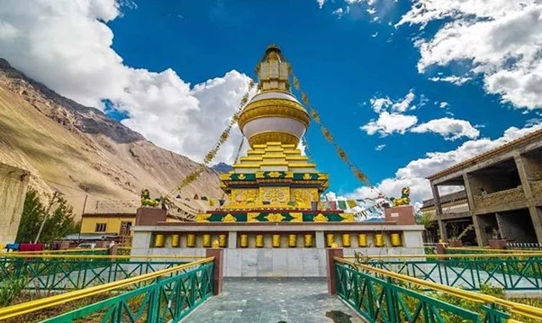 Golden Buddhist stupa at Tabo Monastery in Ladakh, radiating serenity and spiritual significance.
