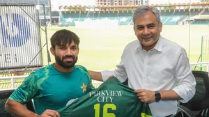 Photo: X/ @TheRealPCB : Mohammad Rizwan was given a shirt by PCB chief Mohsin Naqvi for completing 3000 runs in T20.