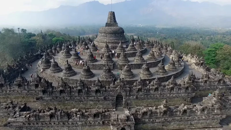 Borobudur Temple in Indonesia, one of the largest temples globally, featuring intricate stone carvings and stunning architecture.