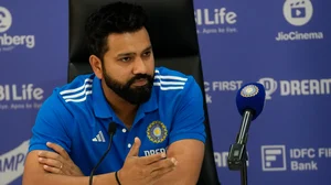 AP Photo/Rajanish Kakade : Indian T20 cricket team's captain Rohit Sharma gestures during a press conference 