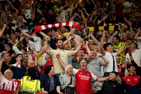 Arsenal's supporters cheer teams' victory