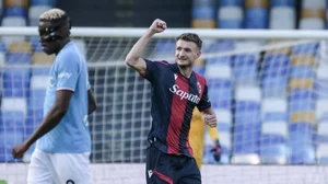 Stefan Posch celebrates as Bologna down Napoli on Saturday