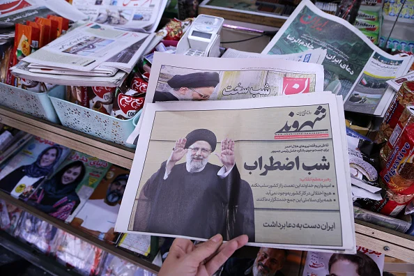Newspapers cover the death of Iranian President Ebrahim Raisi in a helicopter crash on their headlines in the country's press in Tehran, Iran on May 20, 2024.  - null