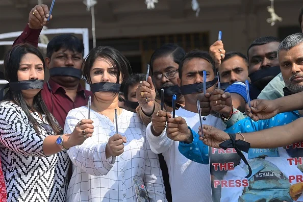  Journalists from print and electronic media carried placards and wore black cloth tied on their mouths in a silent protest against the killing of journalist in Palestinian on International Day in support of Palestinian Journalists. (Representational Image) - (Photo by: Abhisek Saha via Getty Images)