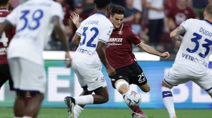 AP : Salernitana's Giulio Maggiore, center right, and Verona's Juan Cabal battle for the ball.