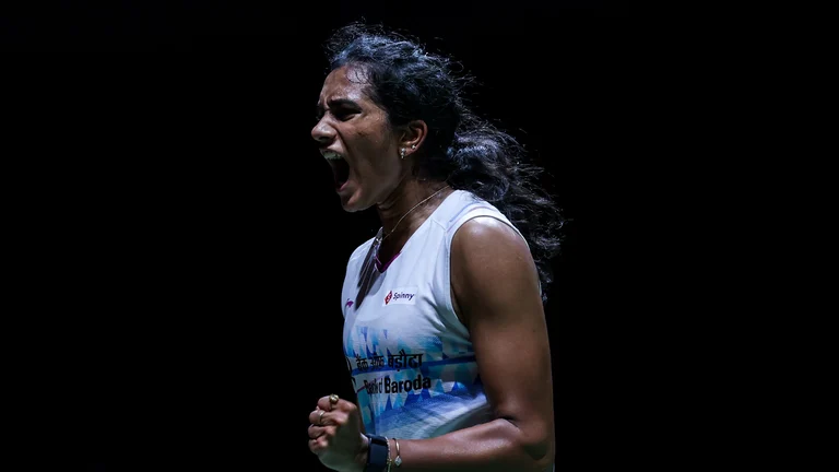 PV Sindhu celebrates her victory over Thailand's Busanan Ongbamrungphan in the Malaysia Masters semi-finals on Saturday (May 25, 2024). - Badminton Photo