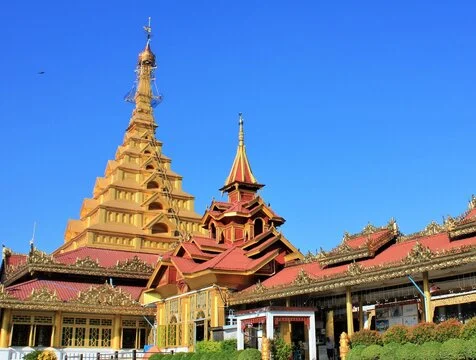 Golden pagoda in Myanmar at Mahamuni Buddha Temple, radiating serenity and spirituality.