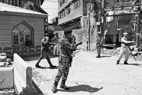 On Guard: Security forces manning a street in Srinagar