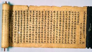 Ancient Chinese scroll with intricate writing on Buddhism, showcasing the rich cultural heritage of China.