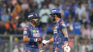 X | Lucknow Super Giants  : LSG's Nicholas Pooran (first from left) and KL Rahul in action against MI in match 67 of IPL 2025 at Wankhede. 