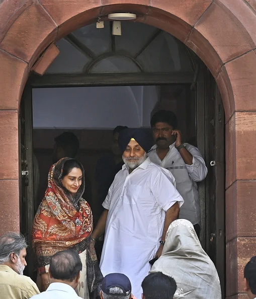 SAD President Sukhbir Singh Badal with wife and SAD MP Harsimrat Kaur Badal at Parliament House complex during Budget Session on March 14, 2023 - Getty Images