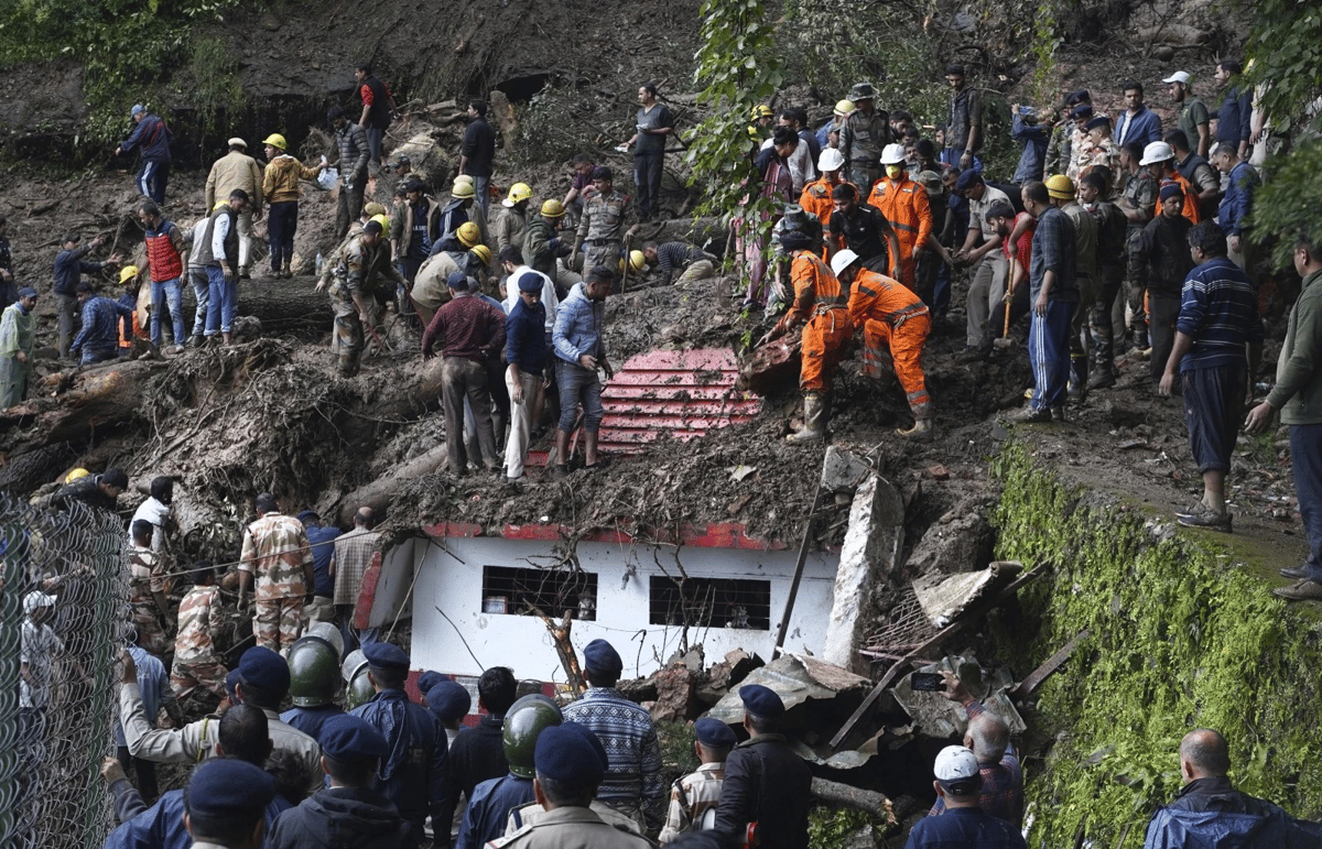 Associated Press : A landslide that struck near a temple on the outskirts of Shimla, Himachal Pradesh, on August 14, 2023.