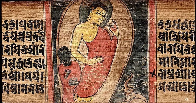 An ancient Buddha painting on a wooden wall, showcasing the serene beauty of this timeless artwork.