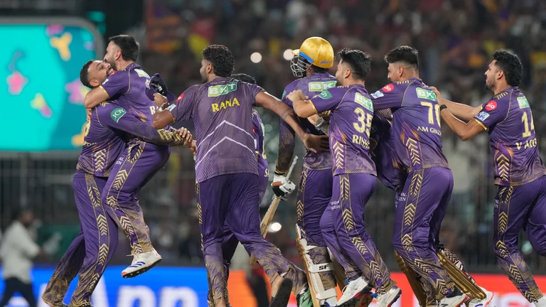 Kolkata Knight Riders players celebrate after wining against Sunrisers Hyderabad during the Indian Premier League cricket final match in Chennai. - AP Photo/Mahesh Kumar A.