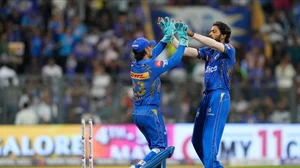 AP Photo/Rajanish Kakade : Mumbai Indians' captain Hardik Pandya, right, celebrates the wicket of Kolkata Knight Riders' Sunil Narine during the Indian Premier League cricket match between Mumbai Indians and Kolkata Knight Riders in Mumbai.