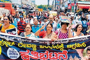 Twitter@CPIMSpeak : United Voices: Women during a protest demanding immediate arrest of Prajwal Revanna