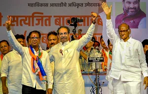 (PTI Photo) : Kolhapur: Shiv Sena (UBT) chief Uddhav Thackeray and NCP (SP) President Sharad Pawar during a public meeting for Lok Sabha polls, in Kolhapur, Wednesday, May 1, 2024. 