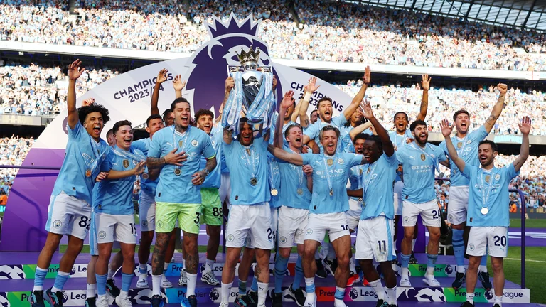 Manchester City players celebrate with the trophy after winning English Premier League 2023-24. - X/Premier League