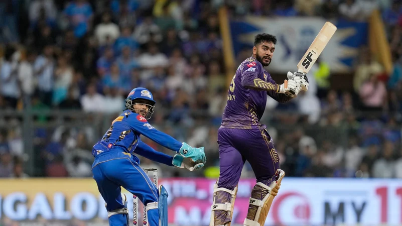 Venkatesh Iyer playing a shot against MI in IPL 2024. AP Photo