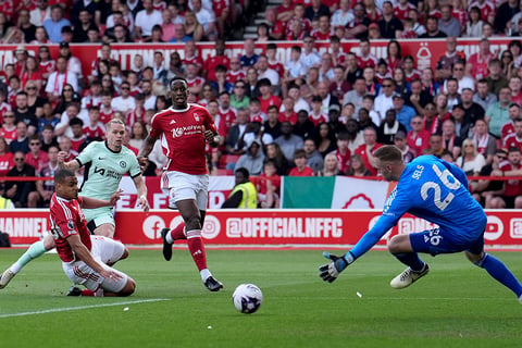 Mykhaylo Mudryk, second left, scores a goal against Nottingham