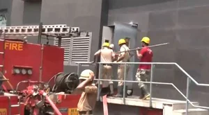 X/ Screengrab from video shared by ANI : Firefighters at Kolkata's Acropolis Mall |
