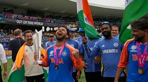 AP/Ramon Espinosa : Rishabh Pant, Kuldeep Yadav and support staff celebrate India's win in the ICC T20 World Cup 2024 final against South Africa, in Barbados.