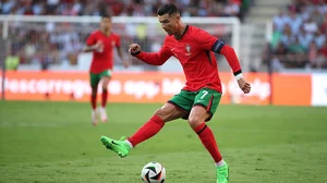 Photo: AP/Luis Vieira : Cristiano Ronaldo controls the ball against Ireland