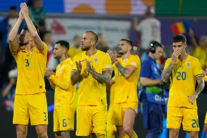 (AP Photo/Martin Meissner) : Romanian players applaud after a Group E match between Belgium and Romania at the Euro 2024 soccer tournament in Cologne, Germany, Saturday, June 22, 2024. 