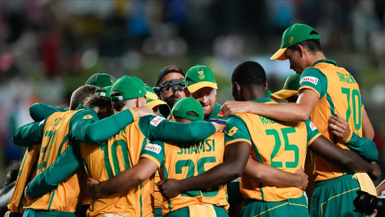 South African players huddle ahead of the men's T20 World Cup semifinal cricket match between Afghanistan and South Africa at the Brian Lara Cricket Academy in Tarouba, Trinidad and Tobago. - AP Photo/Ricardo Mazalan
