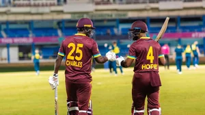 X | Windies Cricket : Johnson Charles and Shai Hope of West Indies stepping on the field ahead of their T20 World Cup warm-up match against Australia on May 31. 