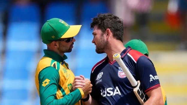 South Africa's Keshav Maharaj, left, and United States' Andries Gous greet each other at the end of the ICC Men's T20 World Cup cricket match between the United States and South Africa at Sir Vivian Richards Stadium in North Sound, Antigua and Barbuda, Wednesday, June 19, 2024. - AP/Ricardo Mazalan