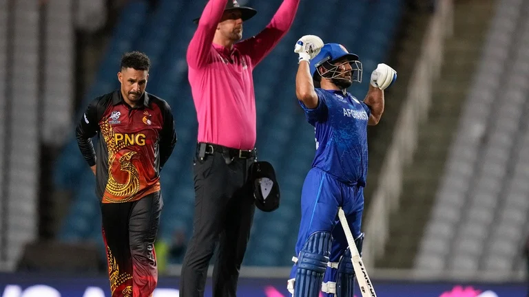 Gulbadin Naib celebrates after hitting the winning six for Afghanistan against Papua New Guinea in their ICC T20 World Cup 2024 match in Trinidad on June 14. - Photo: AP/Ramon Espinosa