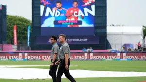  AP Photo/Lynne Sladky : Officials inspect the ground after wet outfield delayed the start of the ICC Men's T20 World Cup cricket match between Canada and India at the Central Broward Regional Park Stadium, Lauderhill, Fla., Saturday, June 15, 2024.
