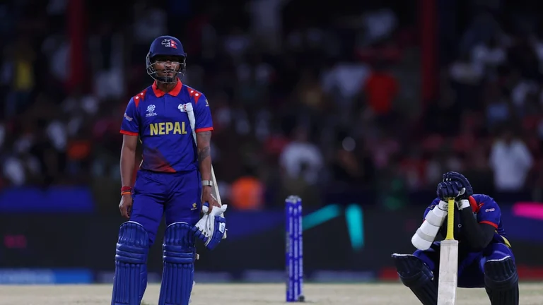 A disconsolate Gulsan Jha (right) and Sompal Kami after Nepal lose to South Africa by one run. - Photo: ICC