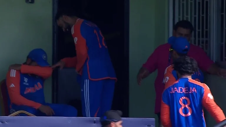 Virat Kohli comforts Rohit Sharma after his side's victory in the 2nd semi-final. - X/mufaddal_vohra