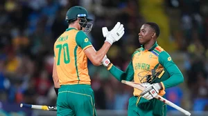 AP/Lynne Sladky : Marco Jansen (left) and Kagiso Rabada celebrate South Africa's win over West Indies in their ICC T20 World Cup 2024, Super Eight match in Antigua.