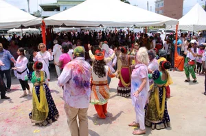 X | India in Guyana  : Indian Guyanese celebrating the festival of holi in Georgetown. 