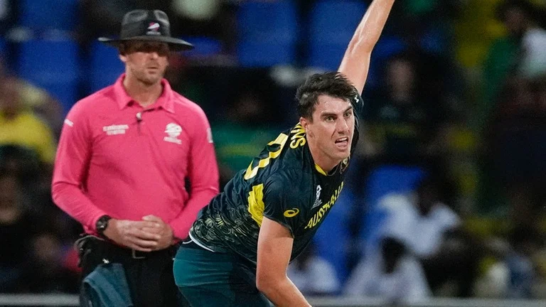 Pat Cummins bowls during the Australia vs Bangladesh, ICC T20 World Cup 2024 match in Antigua. - AP/Lynne Sladky