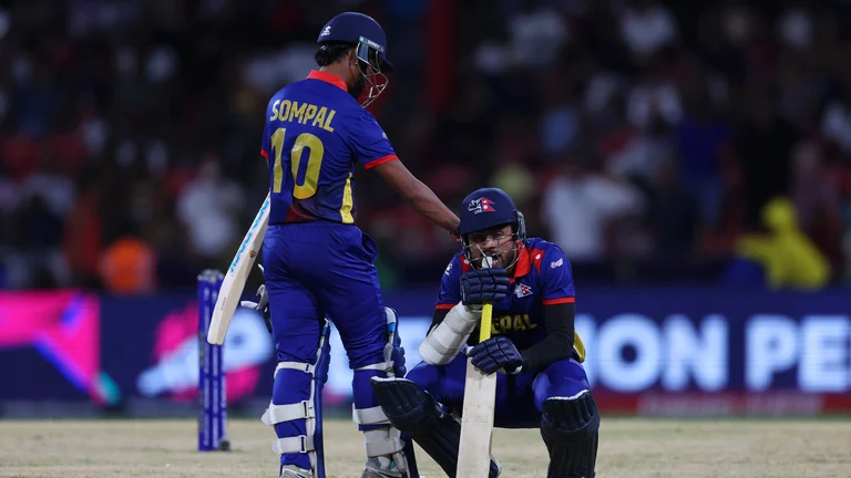 Nepal players Sompal Kami (L) and Gulsan Jha after they lost the match against South Africa by one run in ICC T20 World Cup 2024. - Photo: X/ @T20WorldCup