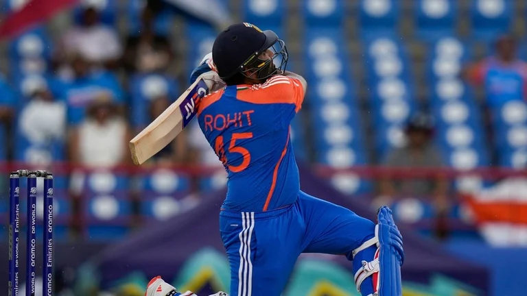 India's captain Rohit Sharma plays a shot for six runs against Australia during an ICC Men's T20 World Cup cricket match at Darren Sammy National Cricket Stadium in Gros Islet, Saint Lucia, Monday, June 24, 2024. - AP/Ramon Espinosa
