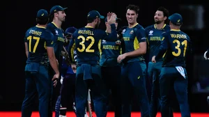 (AP Photo/Ricardo Mazalan)

 : Australia's Pat Cummins, third from right, celebrates with teammates after taking the wicket of Namibia's Jan Frylinck for one run during an ICC Men's T20 World Cup cricket match at Sir Vivian Richards Stadium in North Sound, Antigua and Barbuda, Tuesday, June 11, 2024.
