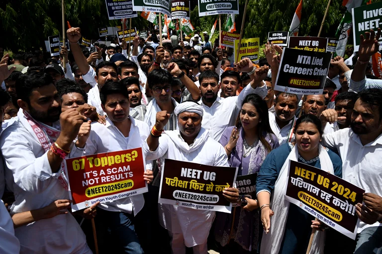Congress workers protest against alleged irregularities in the NEET examination in New Delhi on June 9, 2024 - Getty Images
