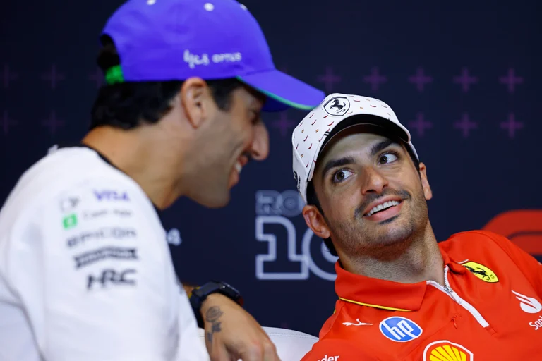 Ferrari driver Carlos Sainz of Spain, right, speaks with RB team driver Daniel Ricciado of Australia during a press conference at the Barcelona Catalunya racetrack in Montmelo, near Barcelona, Spain, Thursday June 20, 2024. The Spanish Grand Prix Formula One race will be held on Sunday.


 -  (AP Photo/Joan Monfort)