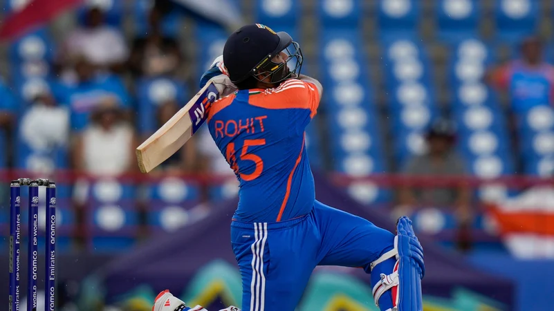 Rohit Sharma playing a shot during his inning against Australia. AP Photo