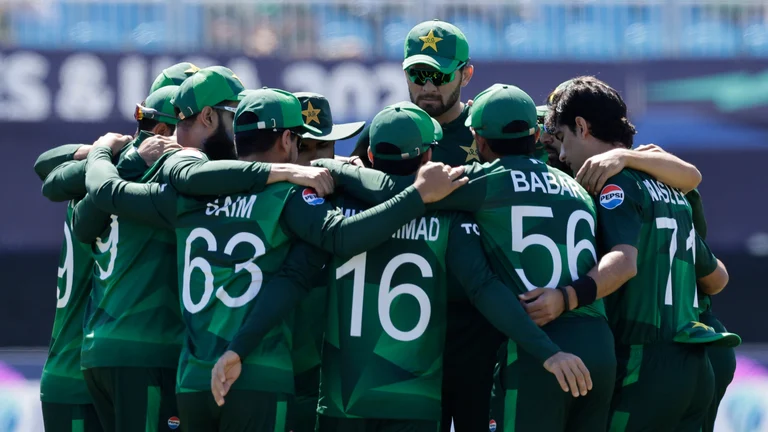 Pakistan players huddle before the start of the ICC Men's T20 World Cup cricket match between Pakistan and Canada at the Nassau County International Cricket Stadium in Westbury, New York, Tuesday, June 11, 2024.  - (AP Photo/Adam Hunger)


