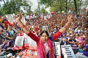 Photo: PTI : Common Cause: ASHA health workers during a protest demanding higher wages in Patna on March 11, 2022