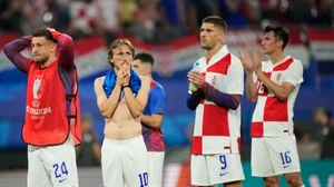 AP/Ebrahim Noroozi : Luka Modric, Croatia players applaud their fans after their exit from the UEFA Euro 2024.