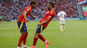 Lamine Yamal and Dani Carvajal celebrate Spain's third goal against Croatia.